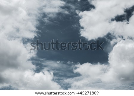 gap of blue sky between the clouds. black and white picture