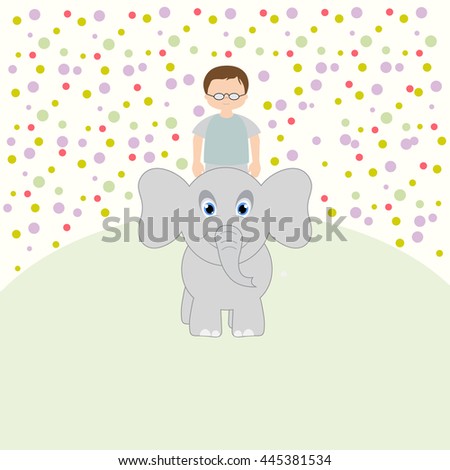 Little boy riding on elephant 