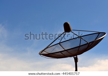 Satellite dish in blue sky and sunshine day