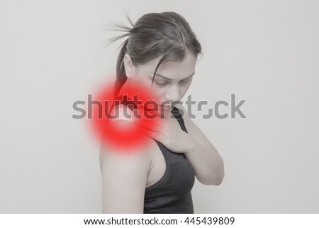 Women Neck, shoulder pain and sticking plaster.Concept photo with Color Enhanced pale skin with read spot indicating location of the pain.