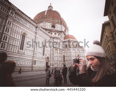 florence woman photographing with camera sports