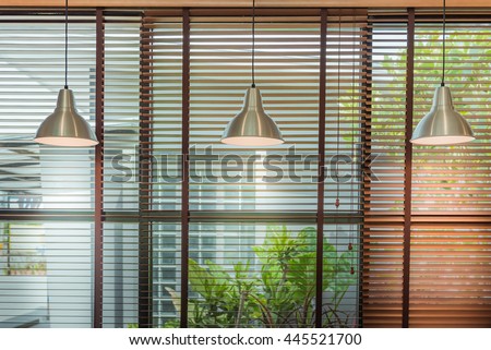 Venetian blind window mask, room interior with ceiling lamp beam, blinds window decoration concept for banner or background. Royalty-Free Stock Photo #445521700