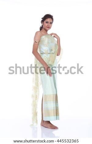 Thai Woman In Green National Traditional Costume Of Thailand in ancient period, ready to go to buddha temple, Studio lighting, white background, stand full body