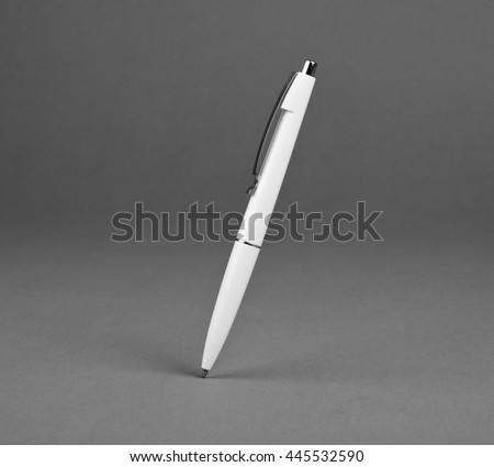 White pen on a gray background