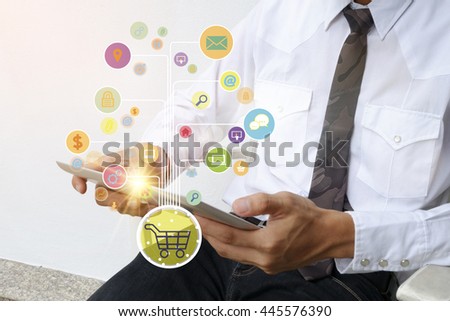 shopping cart with application software icons on taplet , business concept, shopping online concept , business idea