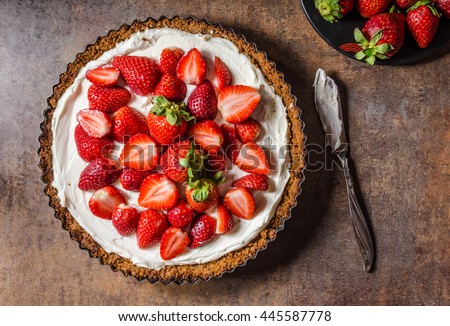Cheesecake with strawberries, bio homemade strawberries from garden, delicious and simple cake Royalty-Free Stock Photo #445587778