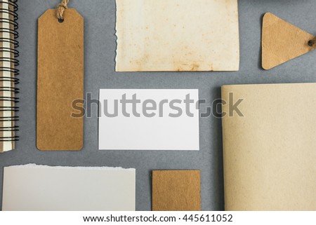 Collection of various paper, cardboard, tag, card and book with soft shadows.