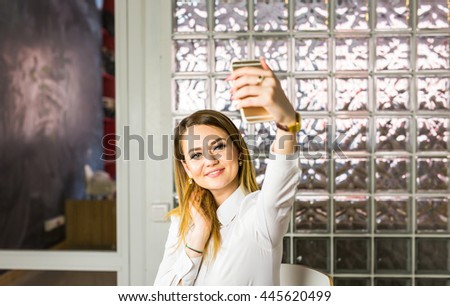 beautiful business woman making selfie photo