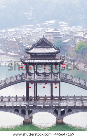 Beautiful Fenghuang ancient town on snowy day , Hunan province China.
