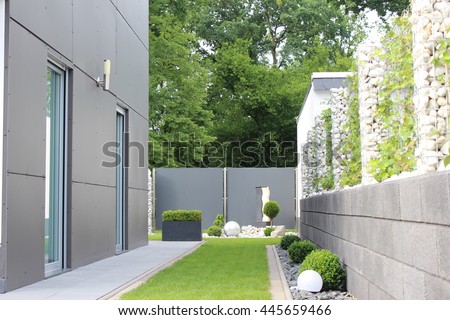 modern  garden of the house Royalty-Free Stock Photo #445659466