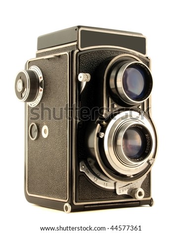 Old camera isolated on pure white