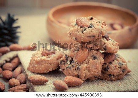 Homemade Almond cookies on a shabby wooden table background - Vintage effect style pictures.