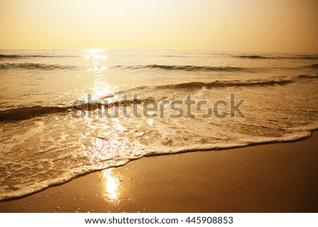 
The sea and the waves on Tropical colorful sunset