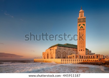 The Hassan II Mosque is the largest mosque in Morocco. Shot  after sunset at blue hour in Casablanca. Royalty-Free Stock Photo #445911187