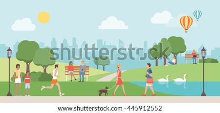 People relaxing in nature in a beautiful urban park, city skyline on the background Royalty-Free Stock Photo #445912552