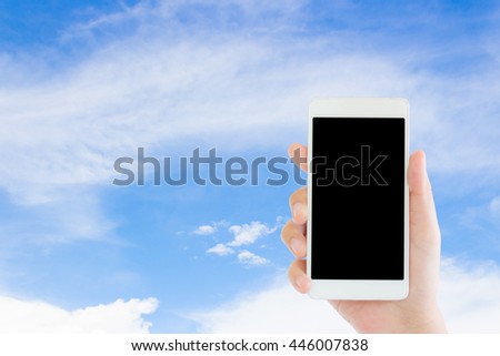 woman use mobile phone and blue sky and white cloud for background