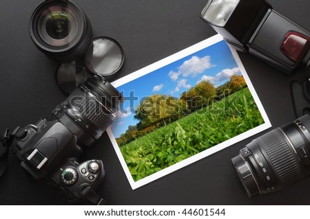 dslr camera lens and image on black background