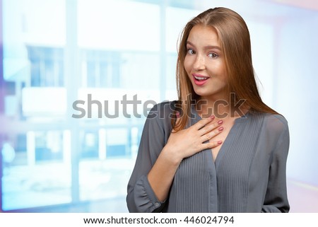  young business woman pointing at herself