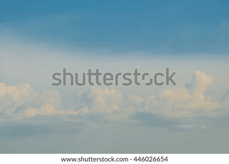 Beautiful soft white clouds against blue sky. Place for text