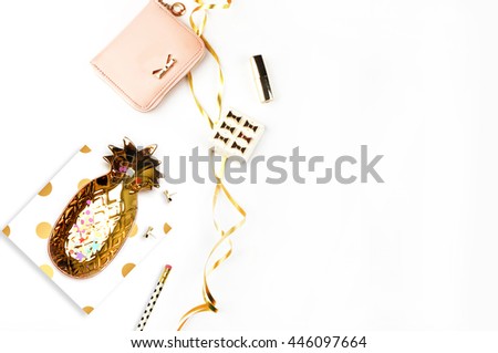 Gold items on the table, top view. Background mockup. Flat lay. Office desktop