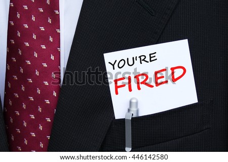 you're fired - the closed up message on the suit pocket of businessman. the concept of human resource management Royalty-Free Stock Photo #446142580