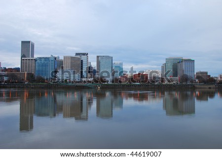 Downtown Portland Oregon on a cloudy winter night reflecting into the Willamette River
