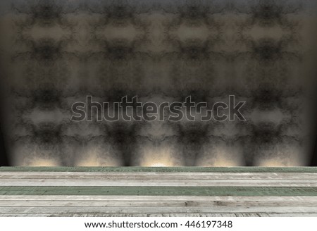 wooden table with abstract background in dark room illuminated by 5 spots