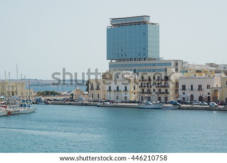 Gallipoli: ancient and modern buildings on the Ionian sea. Salento, Apulia, Italy