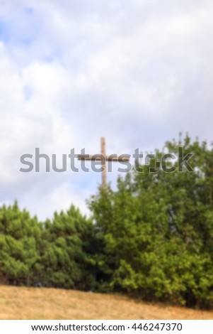   photographed a cross made of wood. cross stands on the site of the Catholic Church, Defocus