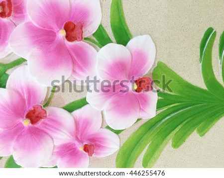 Low relief cement Thai style handcraft of orchid