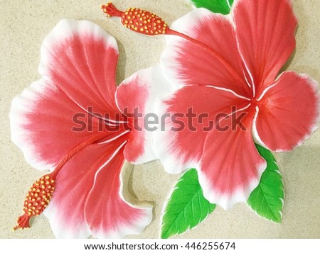 Low relief cement Thai style handcraft of ?hibiscus flower