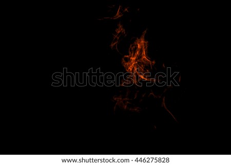 Red smoke on a Black background.