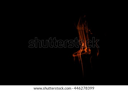Orange smoke on a Black background.