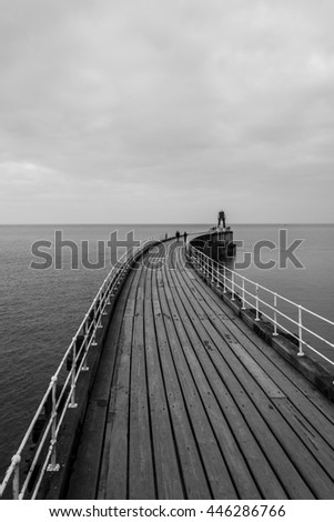 Black and white picture of Whitby Pier, North Yorkshire, U.K.