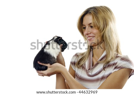 girl plays with Guinea pig