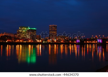 Downtown Portland Oregon on a cloudy winter night reflecting into the Willamette River