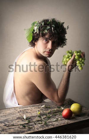 Bacchus holding grapes
