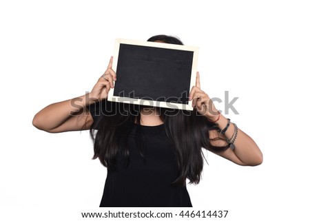 Portrait of latin woman holding chalkboard. Isolated white background.