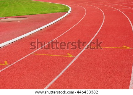 Red running tracks white numbers one two three in stadium for competition or ordering concept