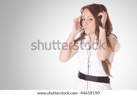 Beautiful young woman with headphones  Listening to Music