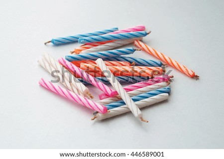 Birthday candles on white background, selective focus and soft focus