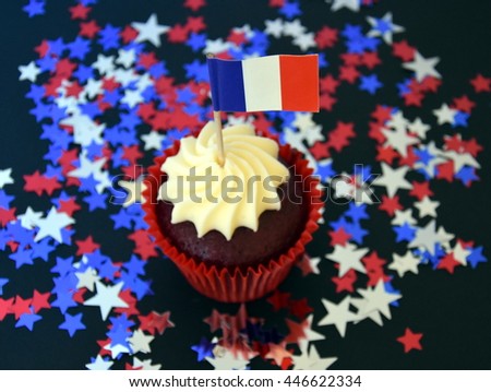 Happy Bastille Day cupcake with red, white and blue french flag. Vive La France.