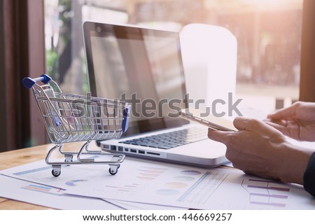 Online shopping concept in the morning time and vintage tone.