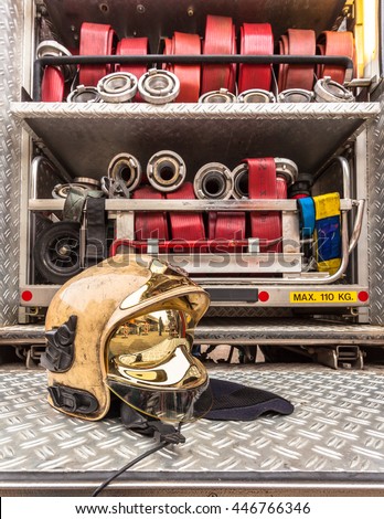 Modern Golden Fire Brigade Helmet and Other Inventory of a Fire Engine