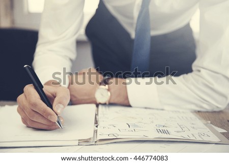 businessman working on documents at office