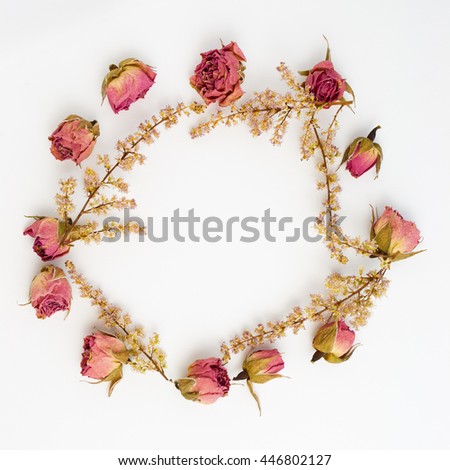Frame with roses isolated on white background. Flat design picture with top view