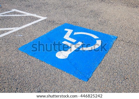 sign of wheelchair on road