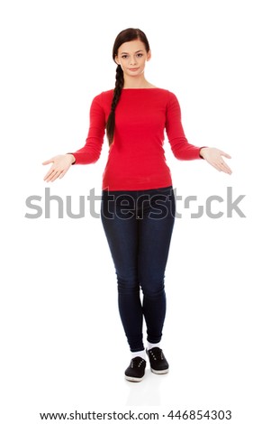 Young smiling woman presenting something 