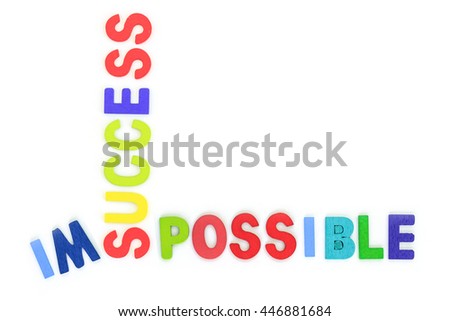 success and possible business concept alphabet letter wood top view on white background