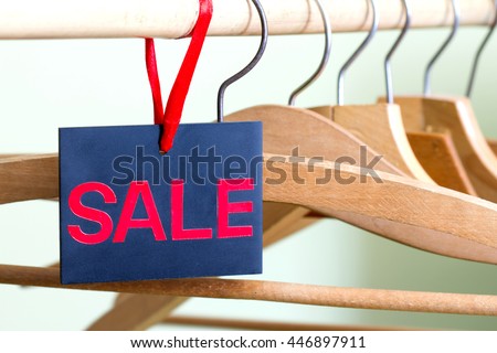 Sale of clothing concept with empty  hangers
